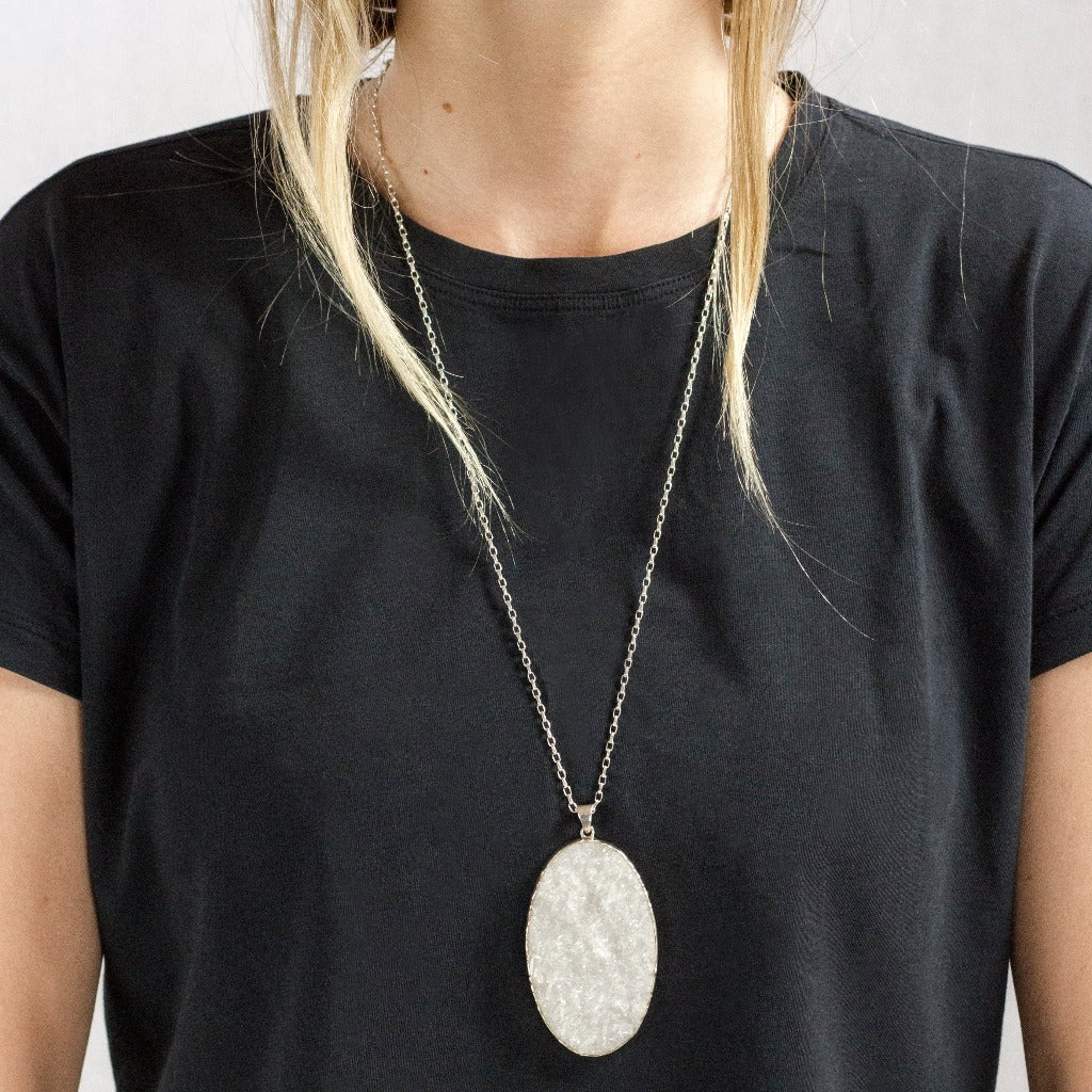 White angelic oval Clear Quartz Druzy Necklace made in earth on model