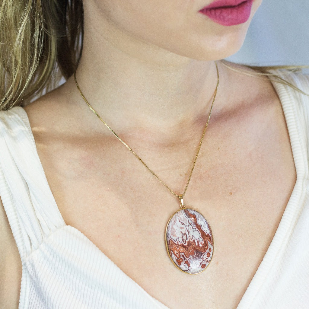 Model Wearing Crazy Lace Agate Made Gold Necklace From Made In Earth