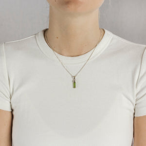 Model Wearing Rich Green Tourmaline raw Pencil Necklace in Sterling Silver Made In Earth