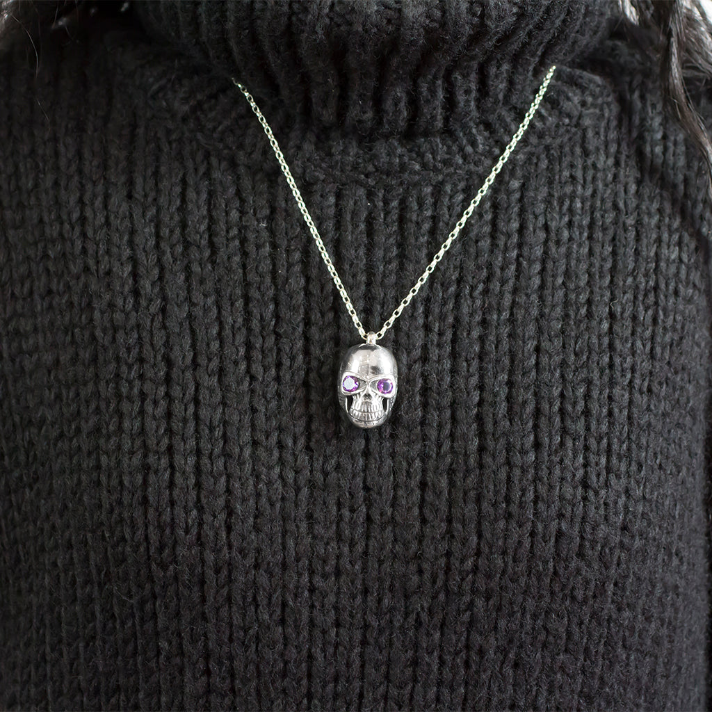 ROUND PURPLE FACETED STERLING SILVER SKULL AMETHYST NECKLACE ON MODEL