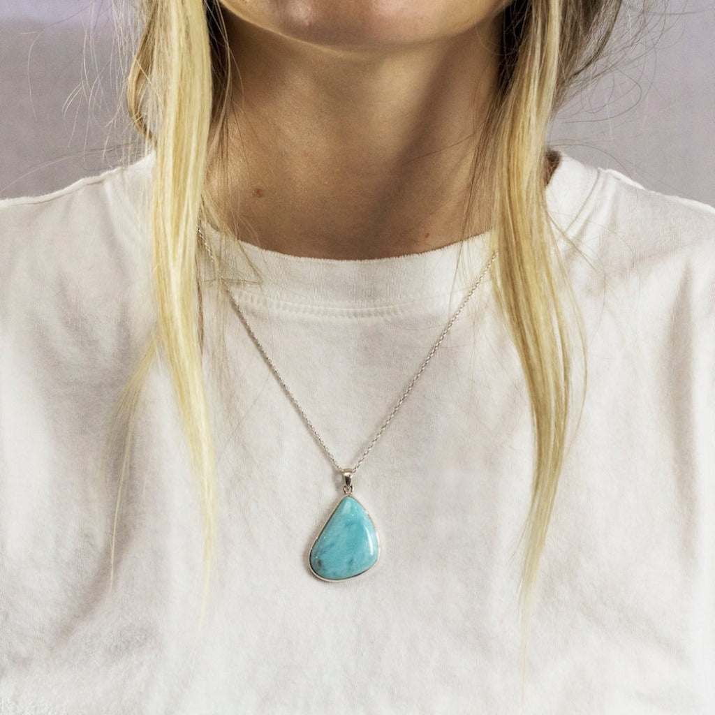 Blue cabochon Larimar necklace on model