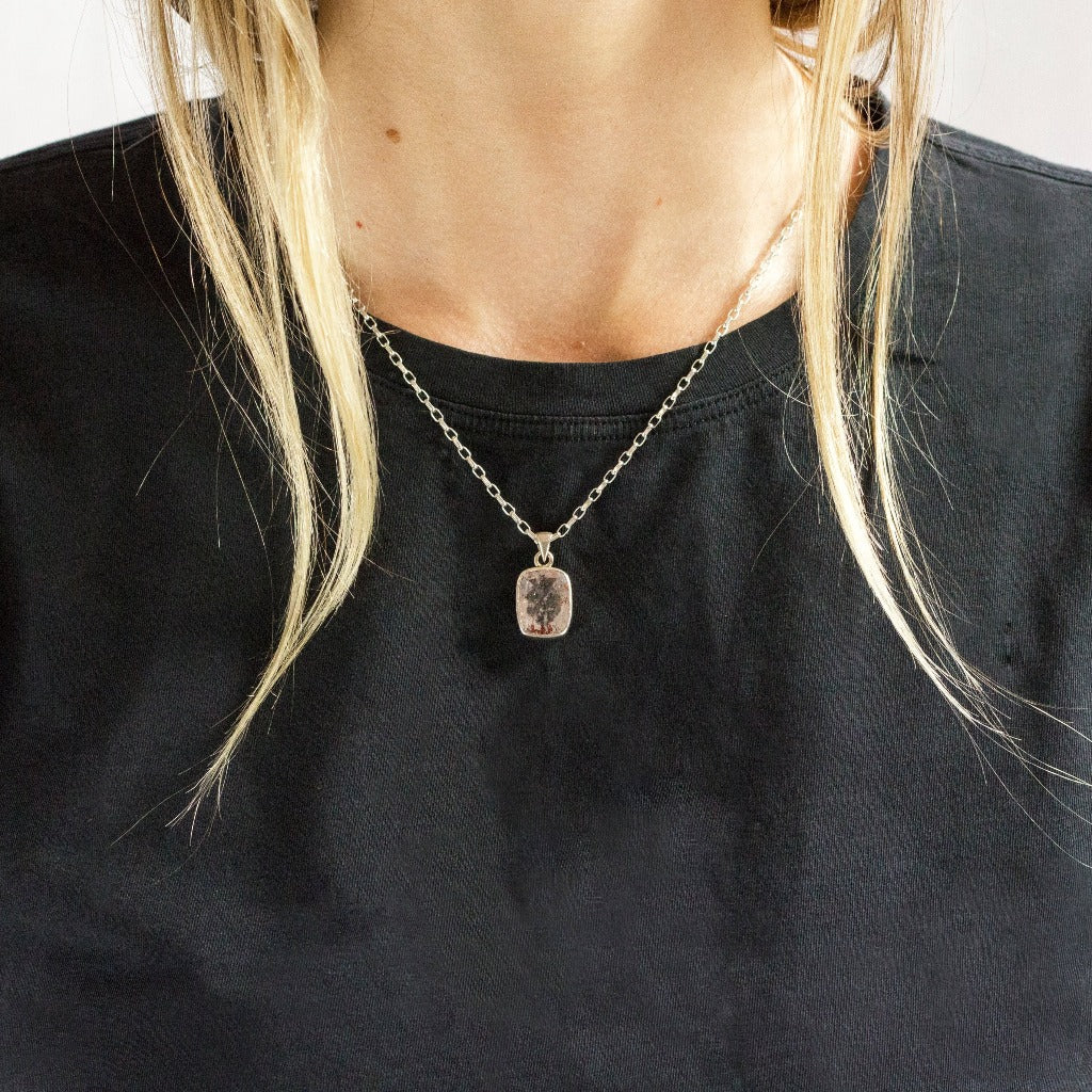 rounded rectangle Clear with red and yellow specks Lepidocrocite Necklace on Model