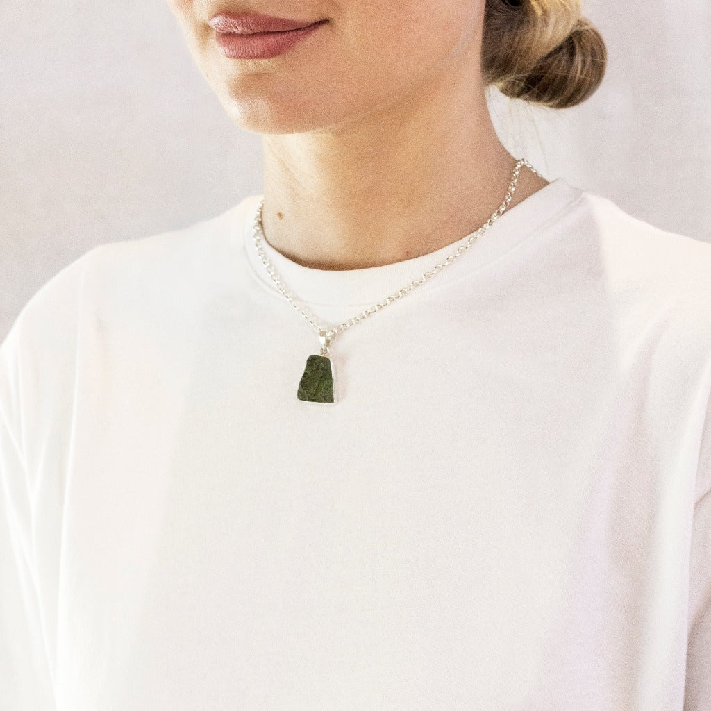 Light forest green translucent Moldavite necklace On Model