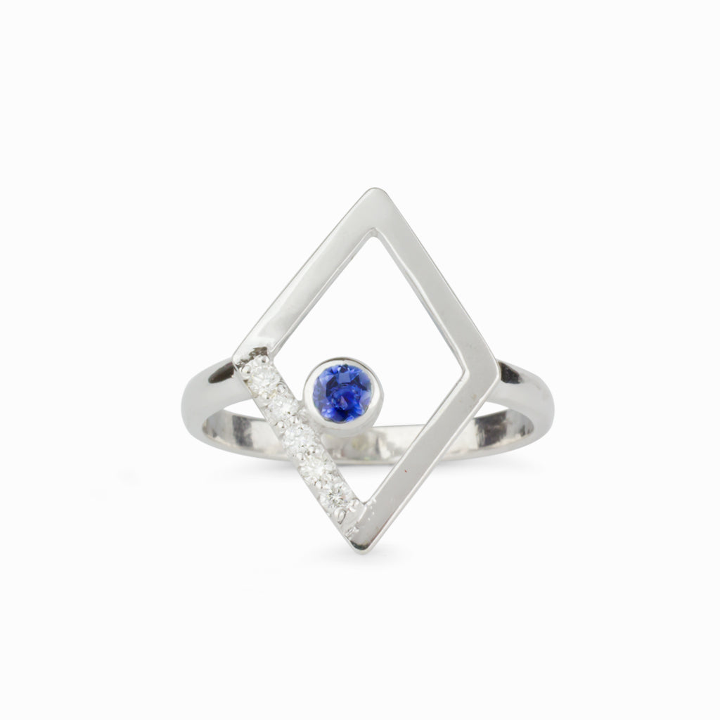 Blue Sapphire & Diamond Ring sit in a Diamond Shape Silver Band Made in Earth
