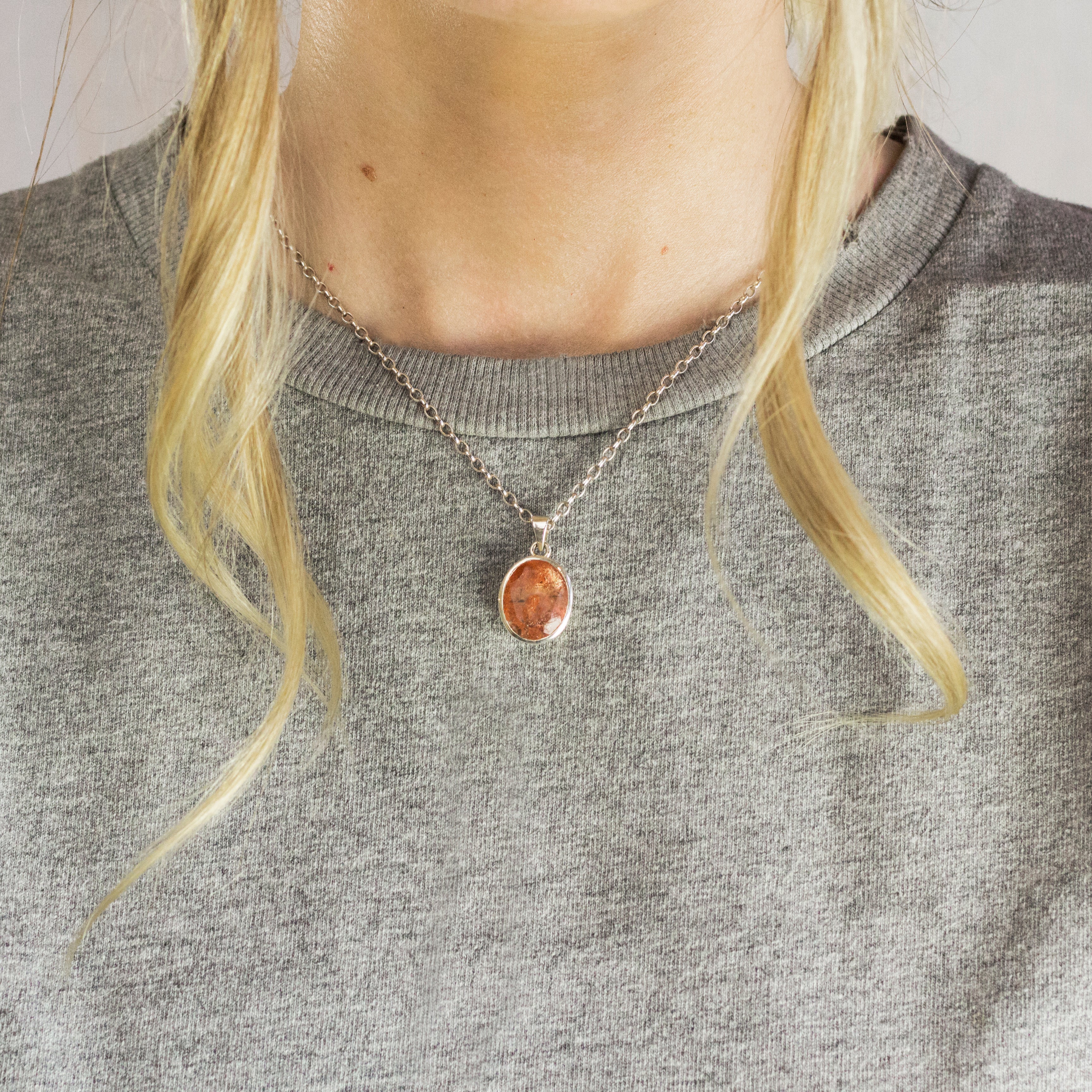 Oval Faceted Sunstone Necklace in Sterling Silver Featured On Model