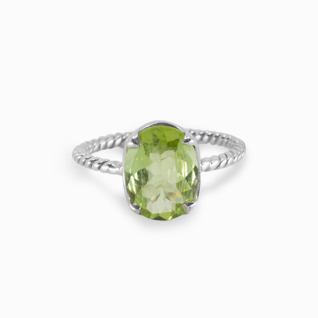 Light green Peridot Ring Made in Earth