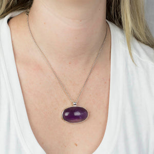OVAL CABOCHON PURPLE STERLING SILVER AMETHYST NECKLACE ON MODEL