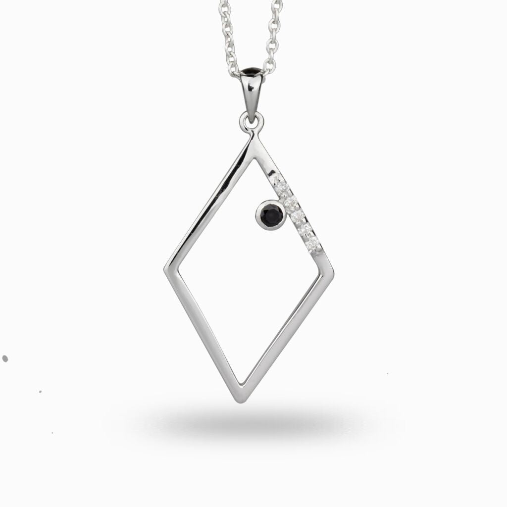 Black Spinel stone accented with diamonds on a rectangular figure Diamond and Black Spinel necklace made in earth