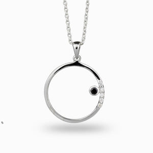 Black Spinel set in silver circle frame Black Spinel & Diamond Necklace made in earth