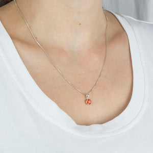 ROUND ORANGE FACETED STERLING SILVER CARNELIAN NECKLACE ON MODEL