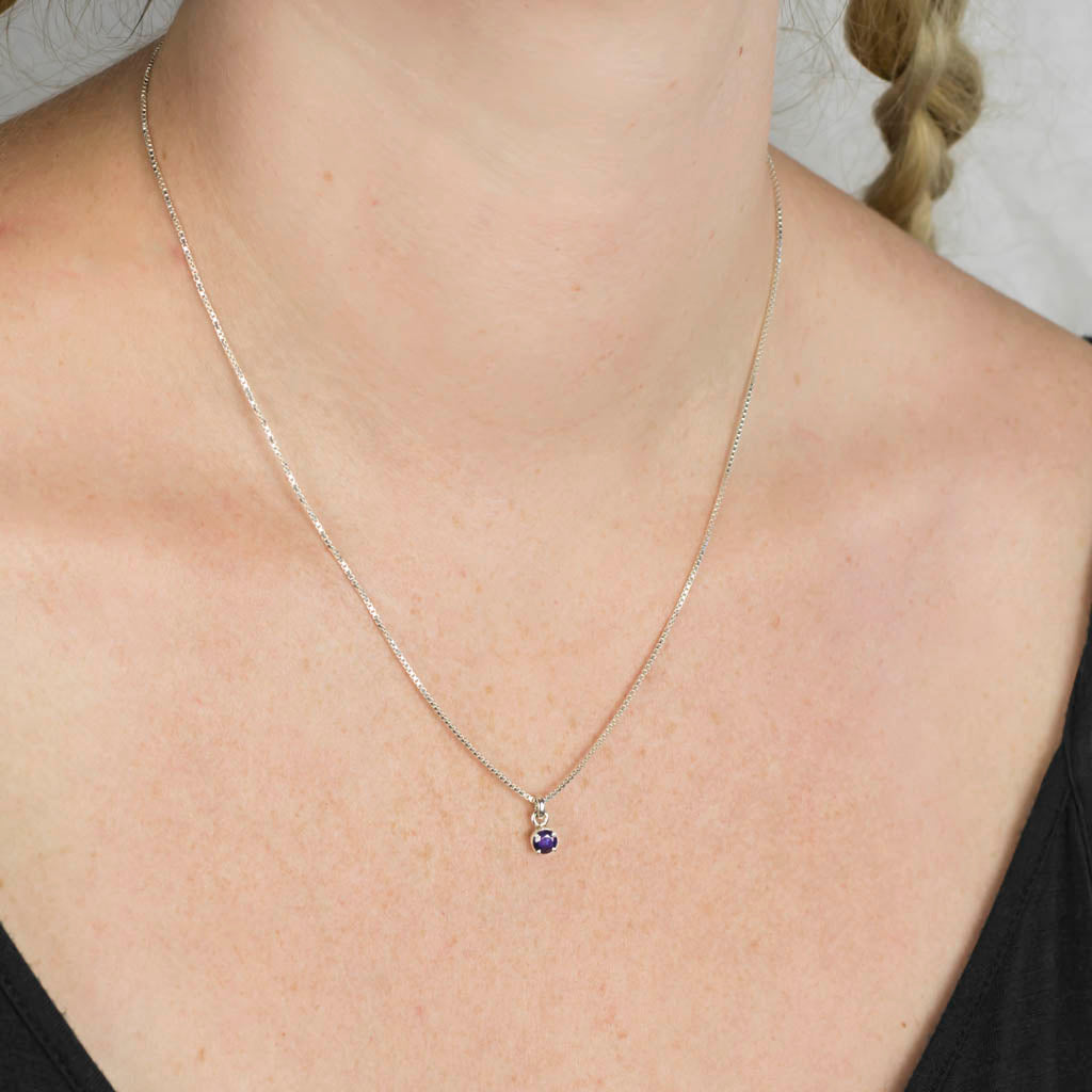 Round faceted Sapphire Necklace in sterling silver prong setting